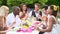 Slow Motion Shot Of Friends Enjoying Outdoor Dinner Party