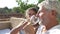 Slow Motion Shot Of Mature Couple Drinking Wine Together