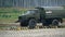 Slow motion shot of Russian military truck Ural moving through obstacles