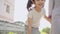 Slow-motion, Sibling running holding hands together in backyard, sister and adorable girl run outdoor with happy. Young mother tak