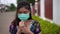 Slow-motion of sick woman wearing surgical mask medical mask is coughing, virus protection.
