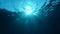 Slow motion, Sunlight rays shining through ocean surface