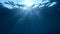 Slow motion, Sunlight rays shining through ocean surface