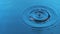 Slow motion. Two droplets of water falling into blue, clean, cold water.