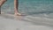 Slow Motion. Unrecognizable Woman Run Barefoot on Tropical Beach