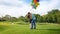 Slow motion video of happy young couple holding balloons and kissing in park