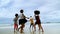 Slow motion video shot of African-American children are dancing and dancing on the beach, in the summer atmosphere.
