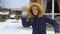 Slow motion video of teenage girl throwing snow ball in camera