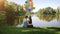 Slow motion video of young kissing couple relaxing by the river and holding big bunch of colorful balloons