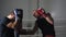 Slow motion view of sportsmen fighting at boxing ring