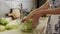 Slow motion of woman hands prepared fresh vegetarian salad