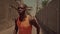 slow motion of young attractive and fit black African American sport man running, an athletic professional runner training hard