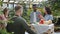 Slow motion of young people choosing organic vegetables in farm market indoors