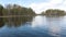 Slow moving boat on lake in Karelia, Russia