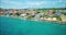 Slow revealing aerial of colorful housing district of Pietermaai in Punda, Curacao