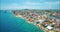 Slow revealing aerial of colorful housing district of Pietermaai in Punda, Curacao