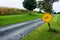 Slow road sign on gravel track in rural Maryland