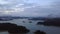 Slow rotating aerial view of morning blue hour with fogs at Lake Kenyir, Terengganu, Malaysia