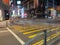 Slow shutter with pedestrians crossing the street in Queen`s Road Central Hong Kong