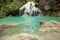 Slow speed shutter of Ko luang waterfall turquoise blue river, Mae Ping National Park, Lum phun, Thailand