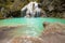 Slow speed shutter of Ko luang waterfall turquoise blue river, Mae Ping National Park, Lum phun, Thailand