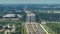 Slow traffic at industrial roadworks in Sarasota, Florida. Wide American highway under construction. Development of