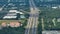 Slow traffic at industrial roadworks in Sarasota, Florida. Wide American highway under construction. Development of