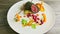 Slow zoom out from modern decorated restaurant meat dish with vegetables