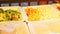 Slowly panorama at rich assortment of cooked vegetables at food court