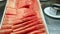 Slowly panorama at white plate served with watermelon slices assortment