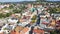 Slowly rising footage of aerial photography with drone in bavarian forest with view of town Grafenau, Germany