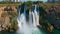 Slowmotion aerial video of the Lower Duden Waterfall in the city of Antalya