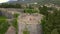 Slowmotion aerial video. A young woman, a man, and their son tourists visit the Fortress Spanjola or the Spanish
