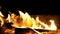 Slowmotion. close up. looped video of fire / campfire. Firewood burns in the fireplace. Fireplace. Bonfire at night. Tongues of fl