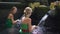 Slowmotion shot of two young women visiting the holly springs in Indonesia. Tirta Empul holy water springs on the Bali