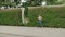 Slowmotion video of fit woman running in the park . sport training