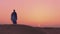 SLOWMOTION. Women wearing beautiful blue and white Arab clothes looking to sunset at the desert