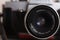 SLR film camera Praktica ltl and 50mm 2.8 Carl Zeiss Jena lens. Retro toning.