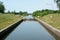 Sluice gate end electric motors on canal banks