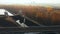 Sluice Gates on the River. Aerial view barge, ship in the river gateway in autumn sunny day.