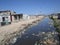 Slum in Haiti with a River Full of Garbage