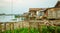 Slum wooden houses on the riverbank of Mahakam, Samarinda, Borneo, Indonesia