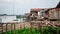 Slum wooden houses on the riverbank of Mahakam, Samarinda, Borneo, Indonesia.