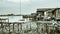 Slum wooden houses on the riverbank of Mahakam, Samarinda, Borneo, Indonesia. monochrome