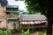 Slums near dirty river with rooftop made from zinc photo taken in Depok Indonesia