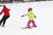 Small active child skiing on snow slope