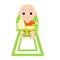 A small adorable baby sits in a highchair with a feeding bottle and a spoon and plate on the top.