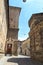 Small alley with Athenaeum of Sciences, Letters and Arts in upper city Citta Alta of Bergamo