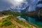 Small alpine lake on green shores in Piedmont, Italy.