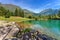 Small alpine lake among mountains.